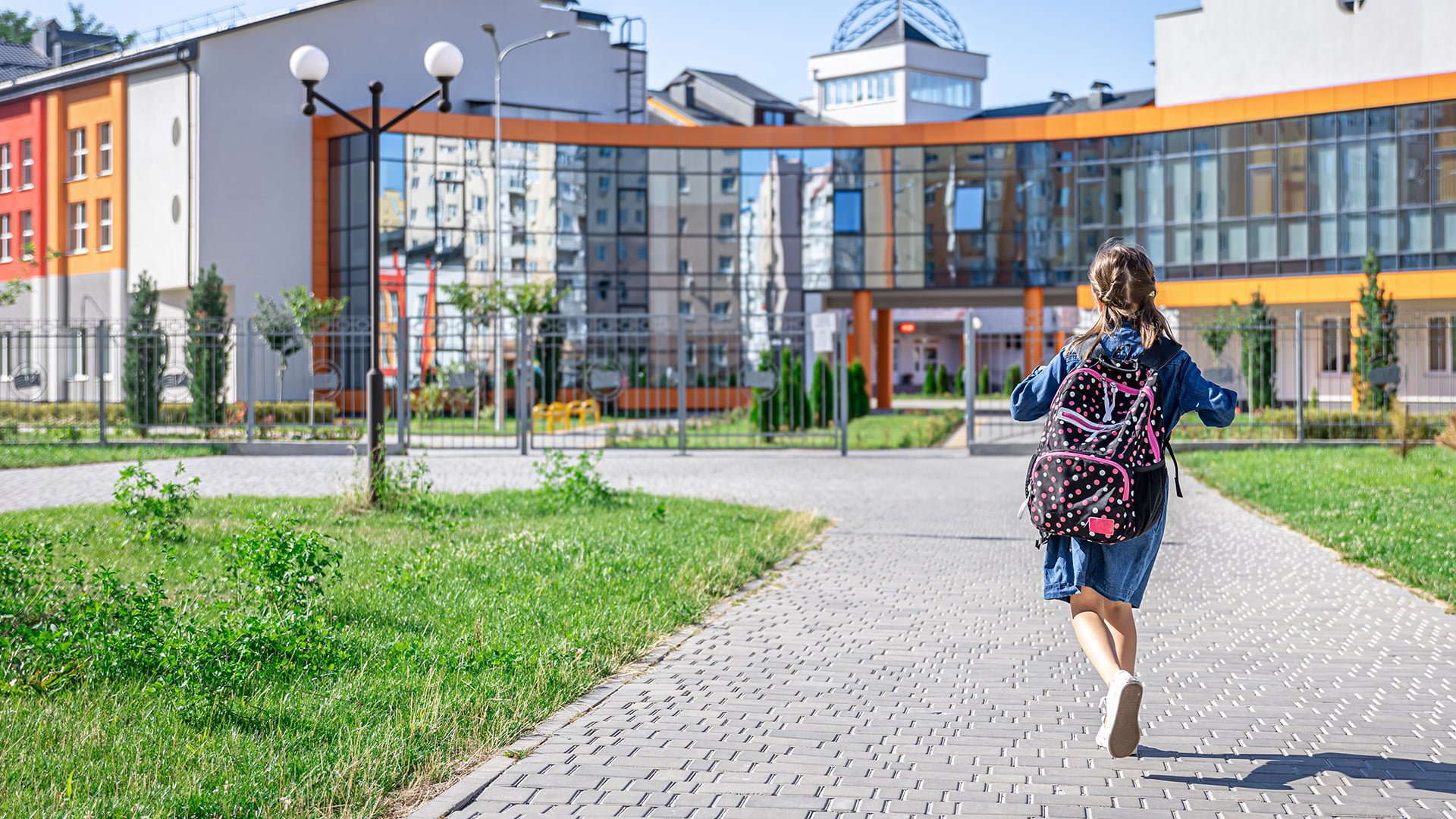 little girl goes elementary school child with backpack is going study back school 1